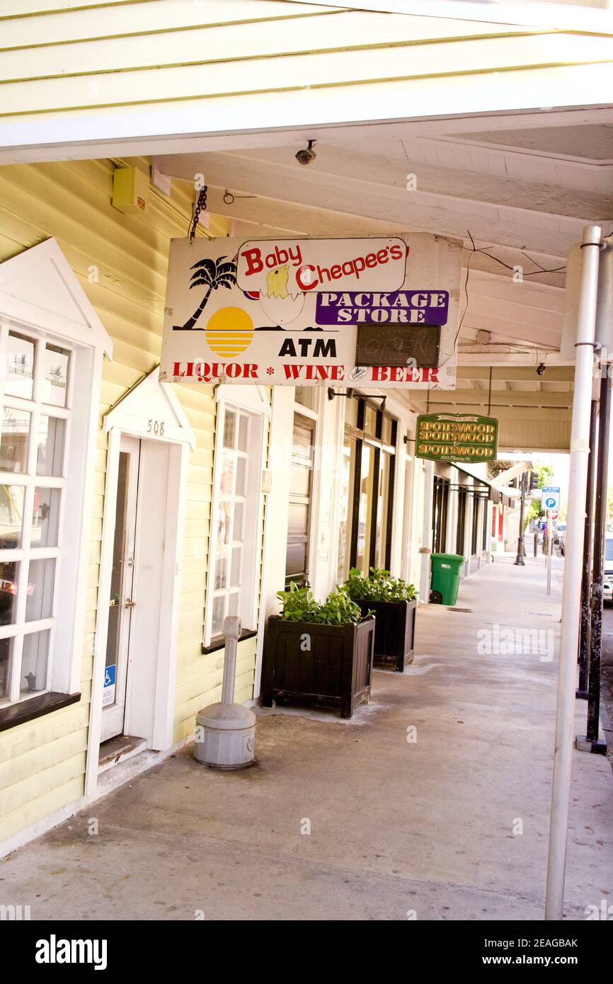 Baby Cheapee's store fronts in Key West, Florida, FL USA.  Southern most point in the continental USA.  Island vacation destination Stock Photo