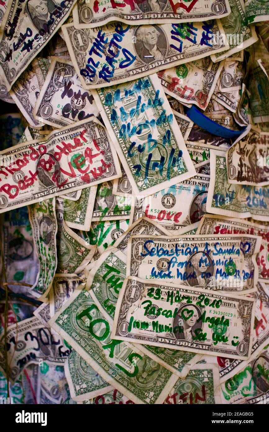 Dollar bills at World Famous Willie T's Bar on Duval Street in Key West, Florida, FL USA.  Southern most point in the continental USA. Island vacation Stock Photo