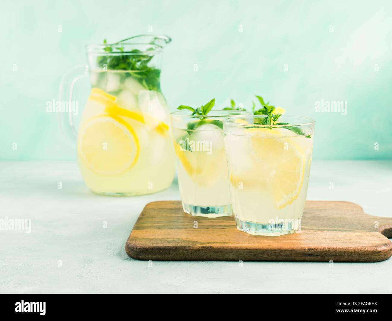 Fresh lemon lemonade in jug and glasses Stock Photo Alamy