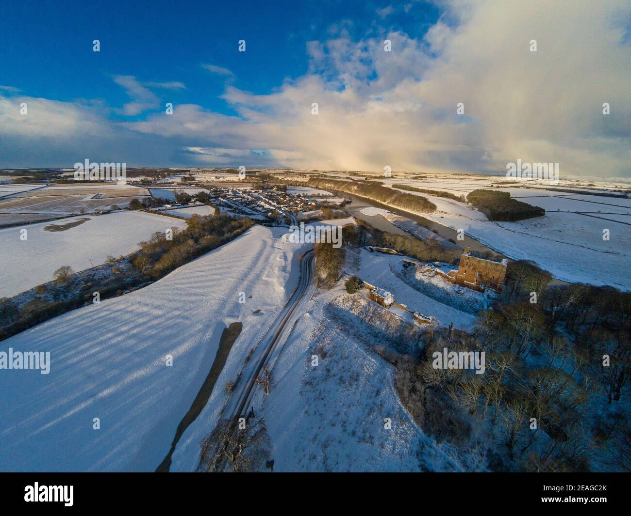 Aerial view of Norham Castle on the Anglo Scottish border after a fall of snow Stock Photo