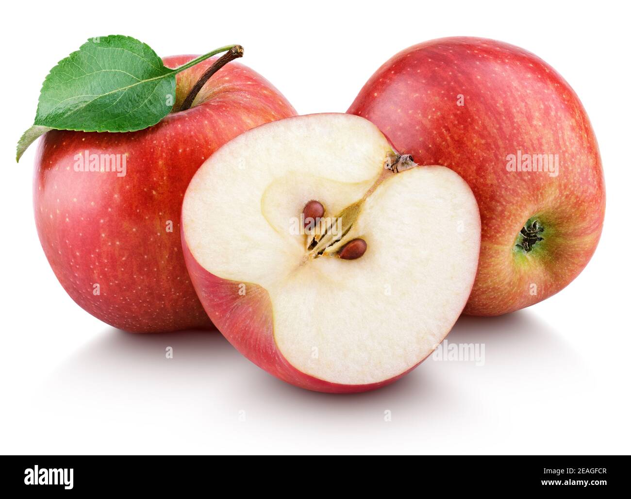 Ripe red apple fruit with apple half and green leaf isolated on white background. Red apples and leaf with clipping path Stock Photo