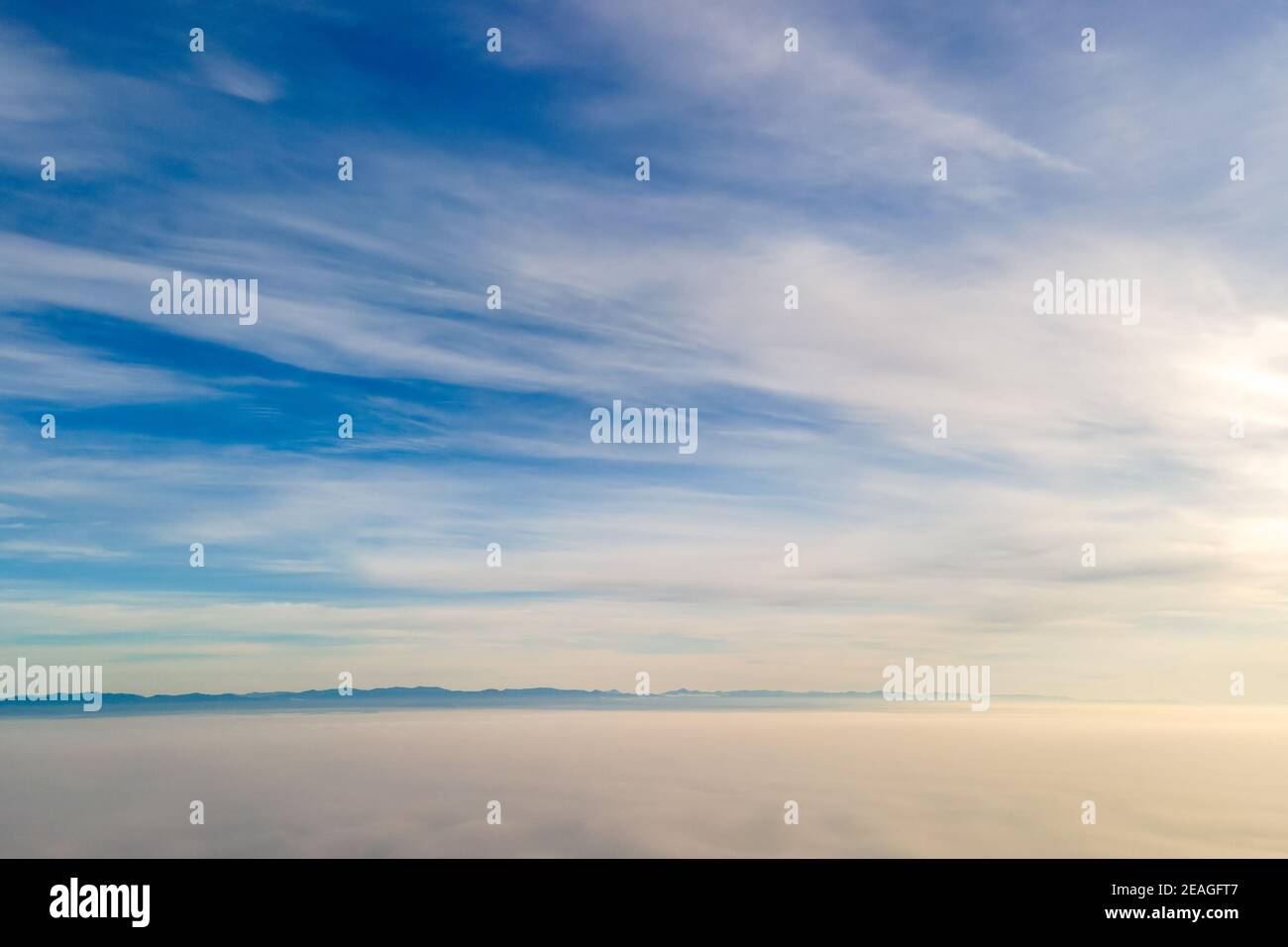 Aerial view from above of white puffy clouds in bright sunny day Stock ...