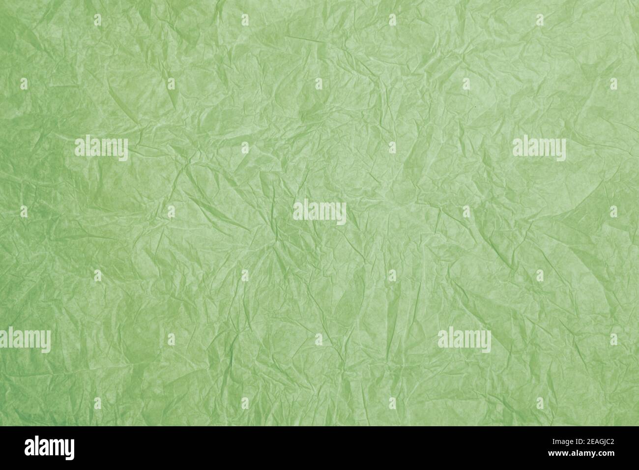 Old crumpled green paper background texture Stock Photo
