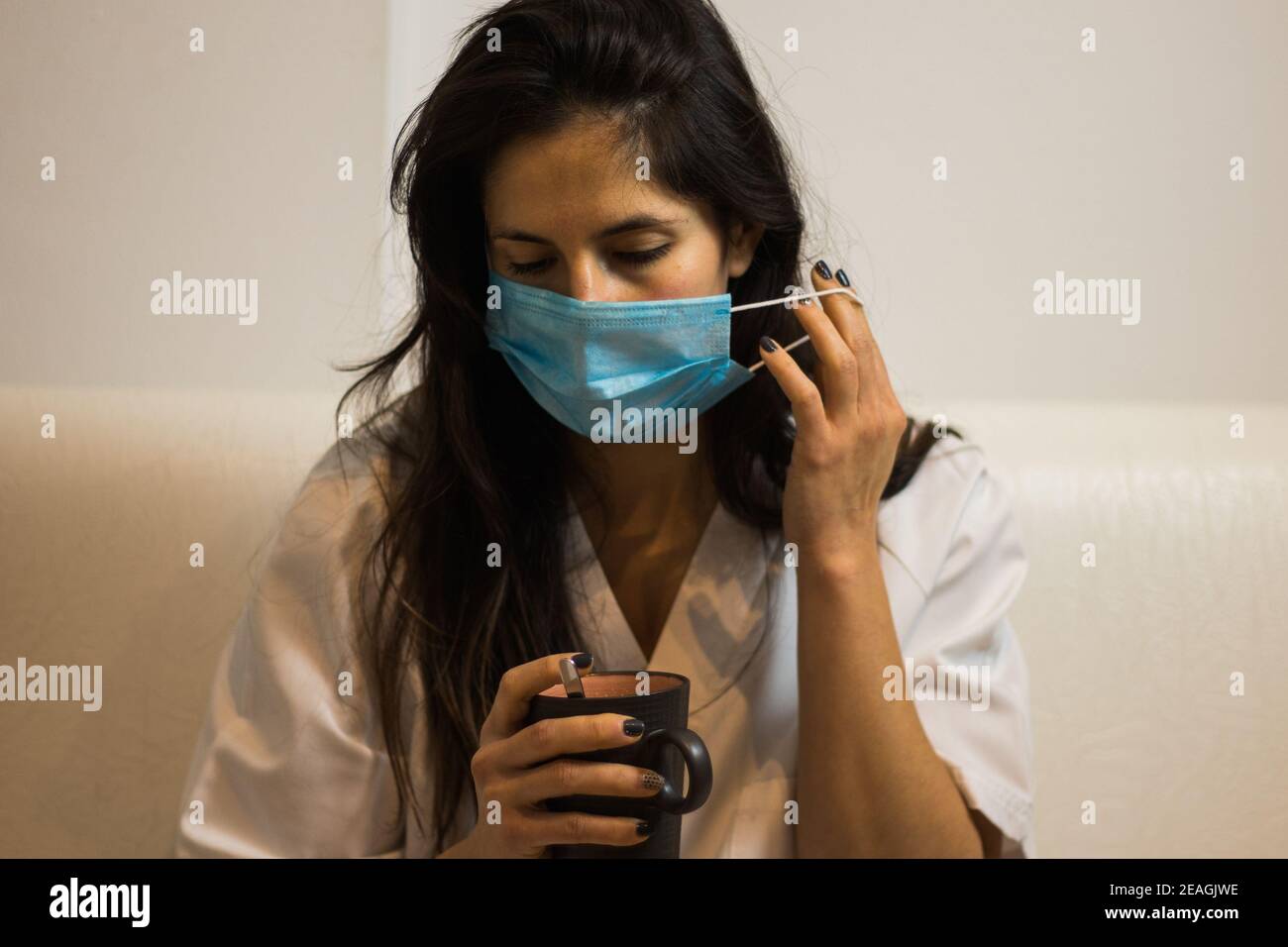 Female doctor nurse taking off hi-res stock photography and images - Alamy