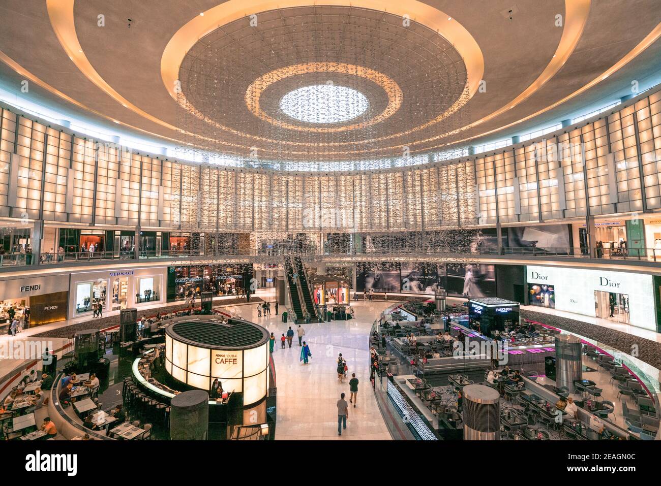 Dubai, UAE - 12.01.2019: People walking by and shopping inside of the Dubai Mall. Several shopping floors, busy as usual. Stock Photo