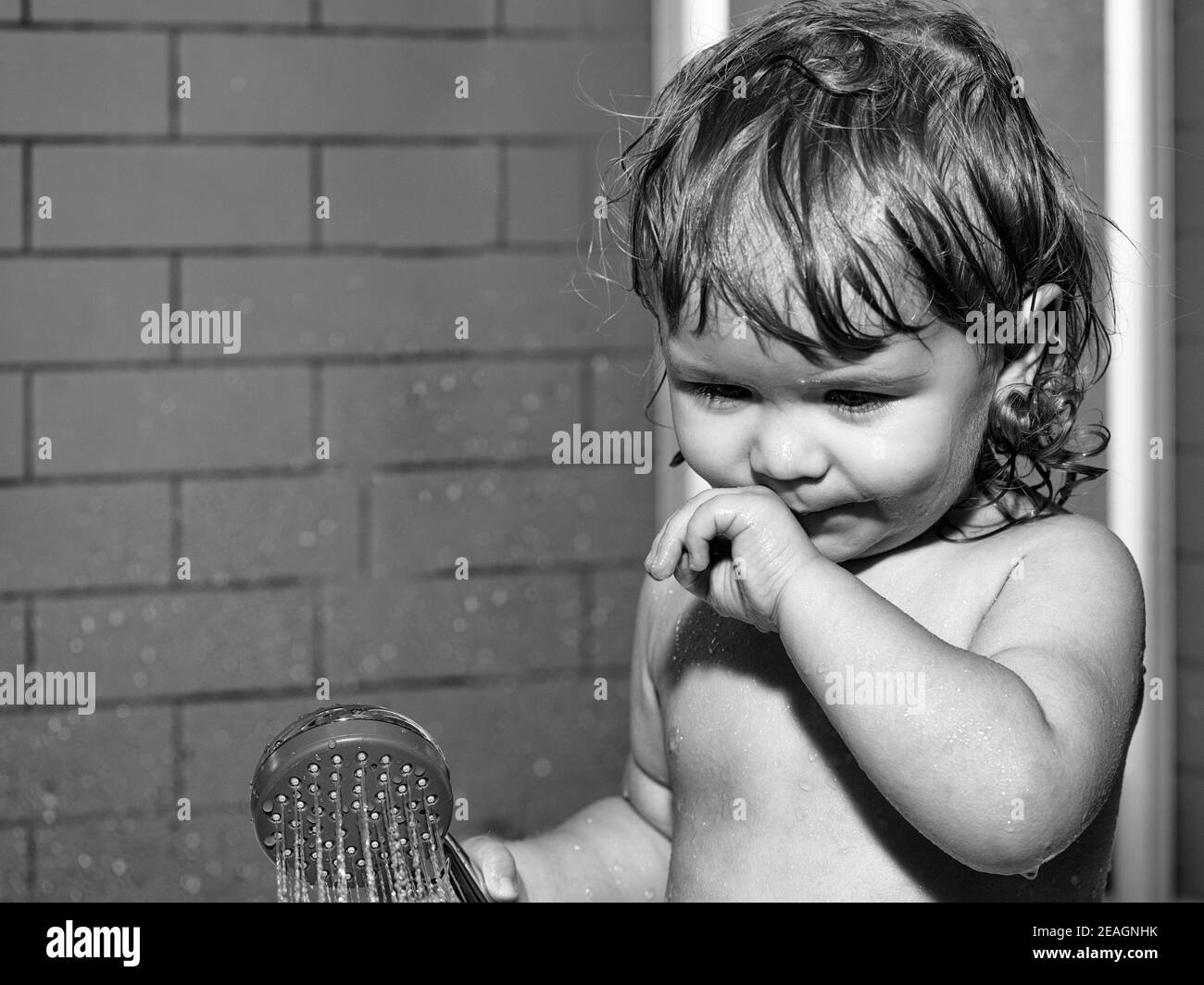 Cute smiling funny boy child with wet hair taking shower in bath with water indoor Stock Photo - Alamy Cute smiling funny boy child with wet hair taking shower in bath with water indoor Stock Photo - Alamy