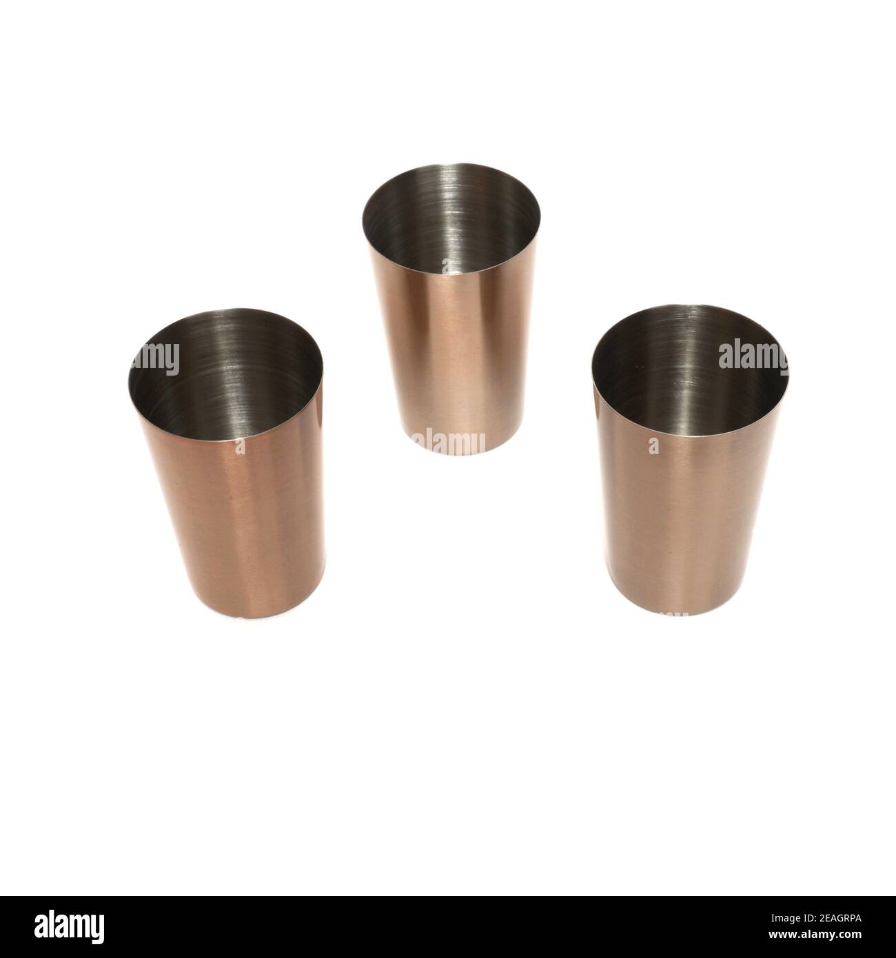 Stainless steel metal shot glasses for liqueur isolated on white background Stock Photo