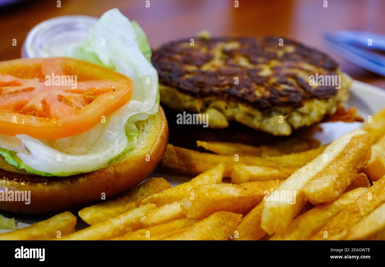Golden French Fries with Crab Cake Sandwich Stock Photo Alamy