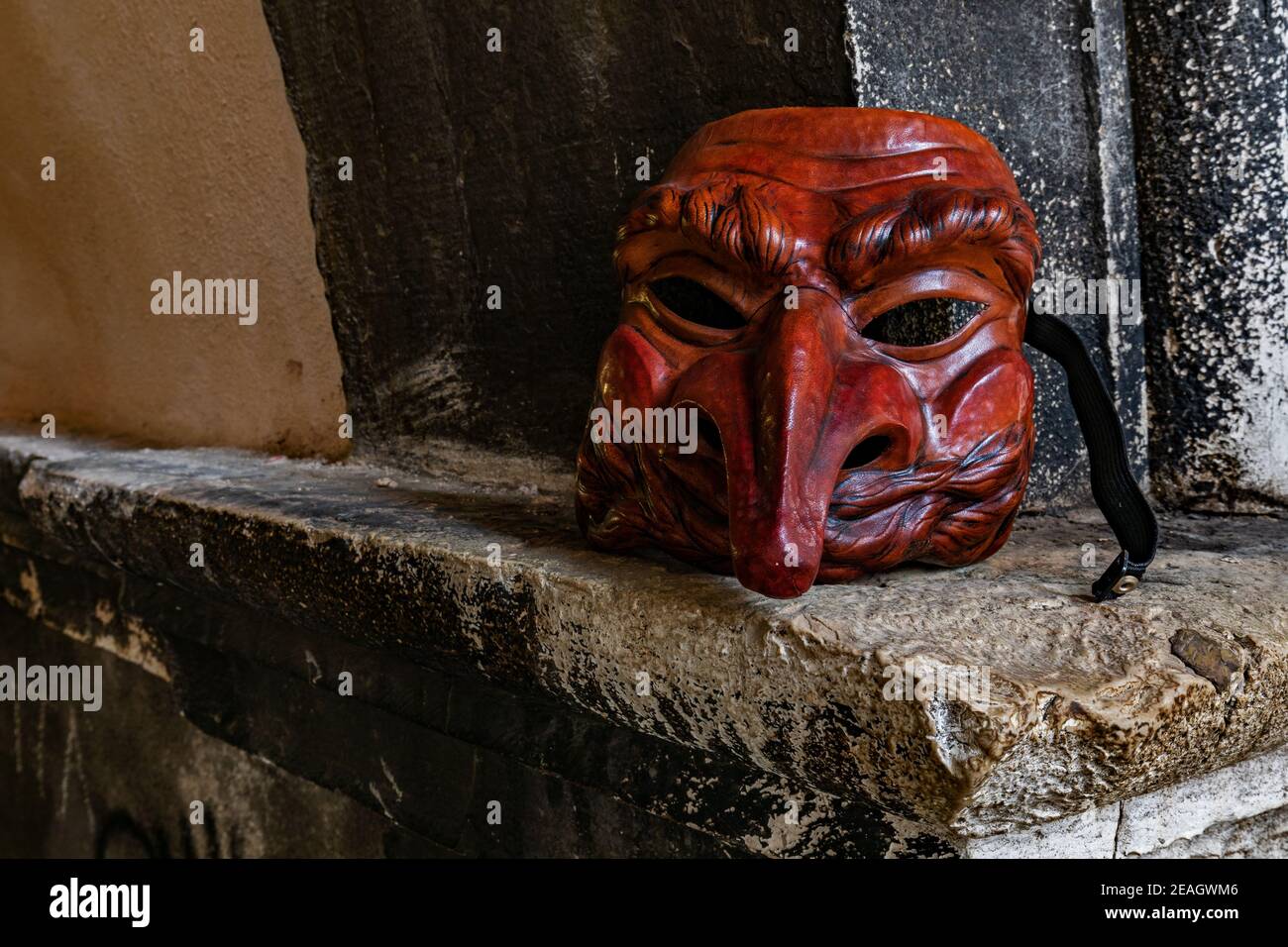 Leather theatre mask of Il Capitano (The Captain) by artist Carlo Setti from Venice who specialises in Commedia Dell'Arte masks. Stock Photo