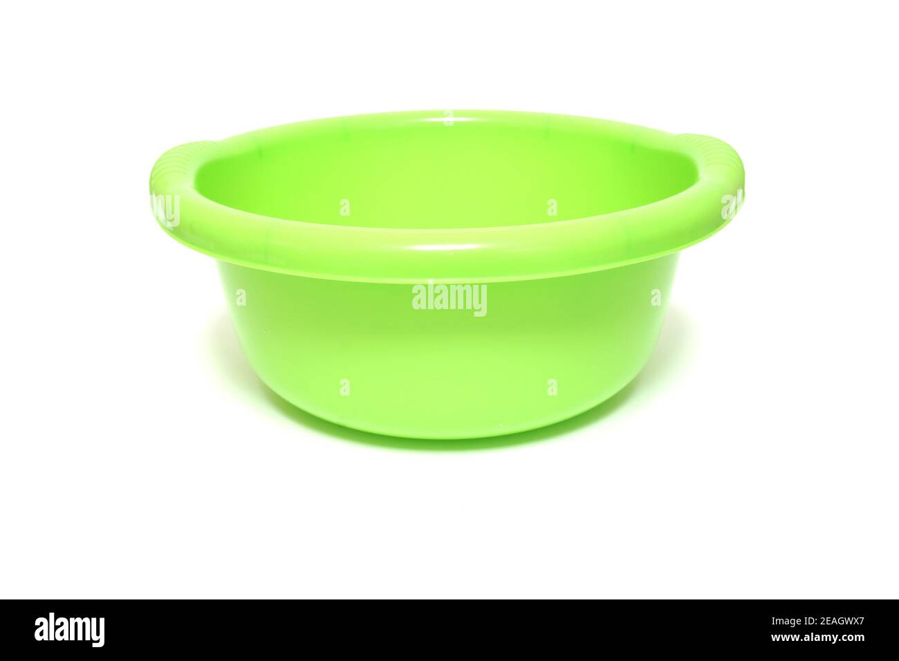 Green plastic bowl isolated on white background Stock Photo