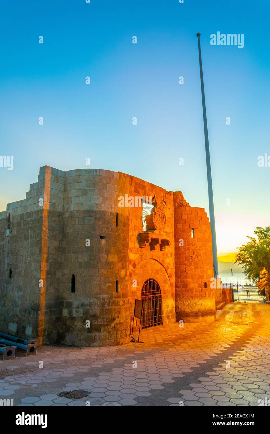 Sunset view of Aqaba castle in Jordan Stock Photo