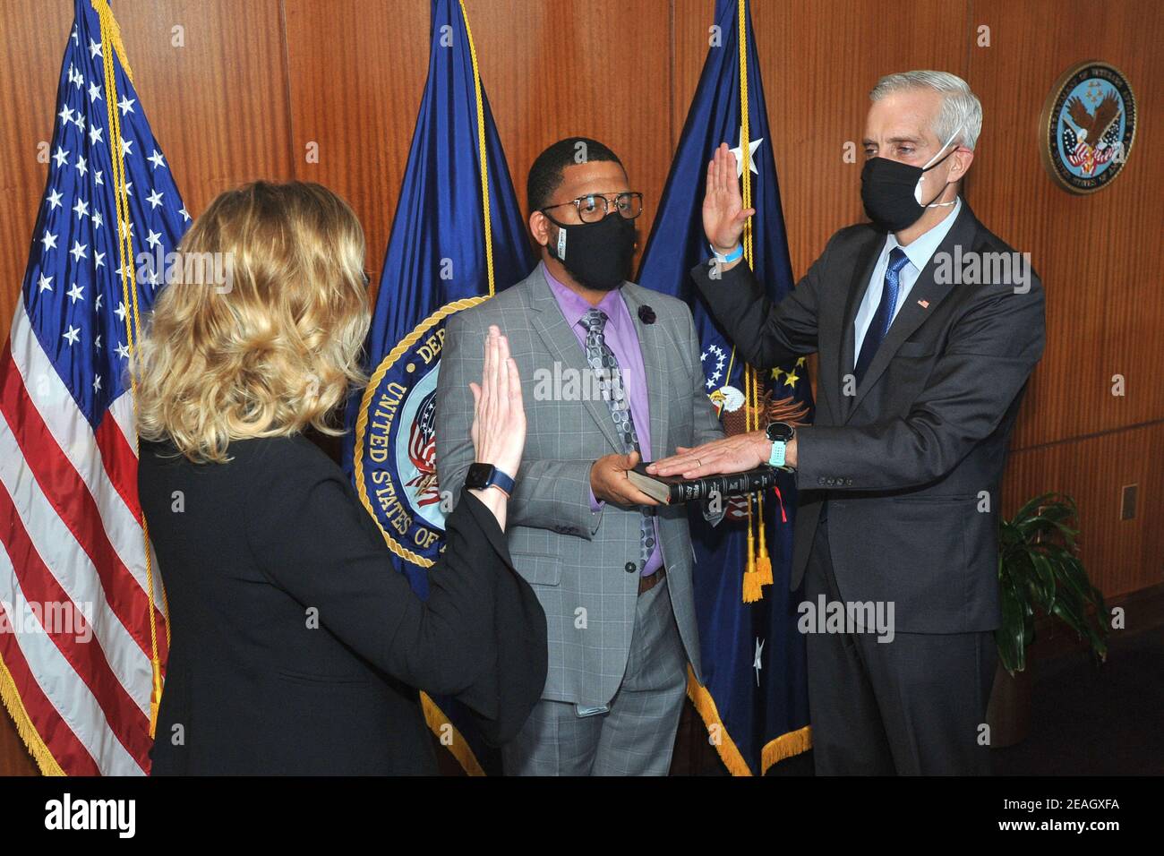 Washington, United States Of America. 09th Feb, 2021. U.S. Secretary of Veterans Affairs Denis McDonough, right, is sworn in following his confirmation by the Senate during a ceremony at the Veterans Affairs headquarters February 9, 2021 in Washington, DC. Credit: Planetpix/Alamy Live News Stock Photo