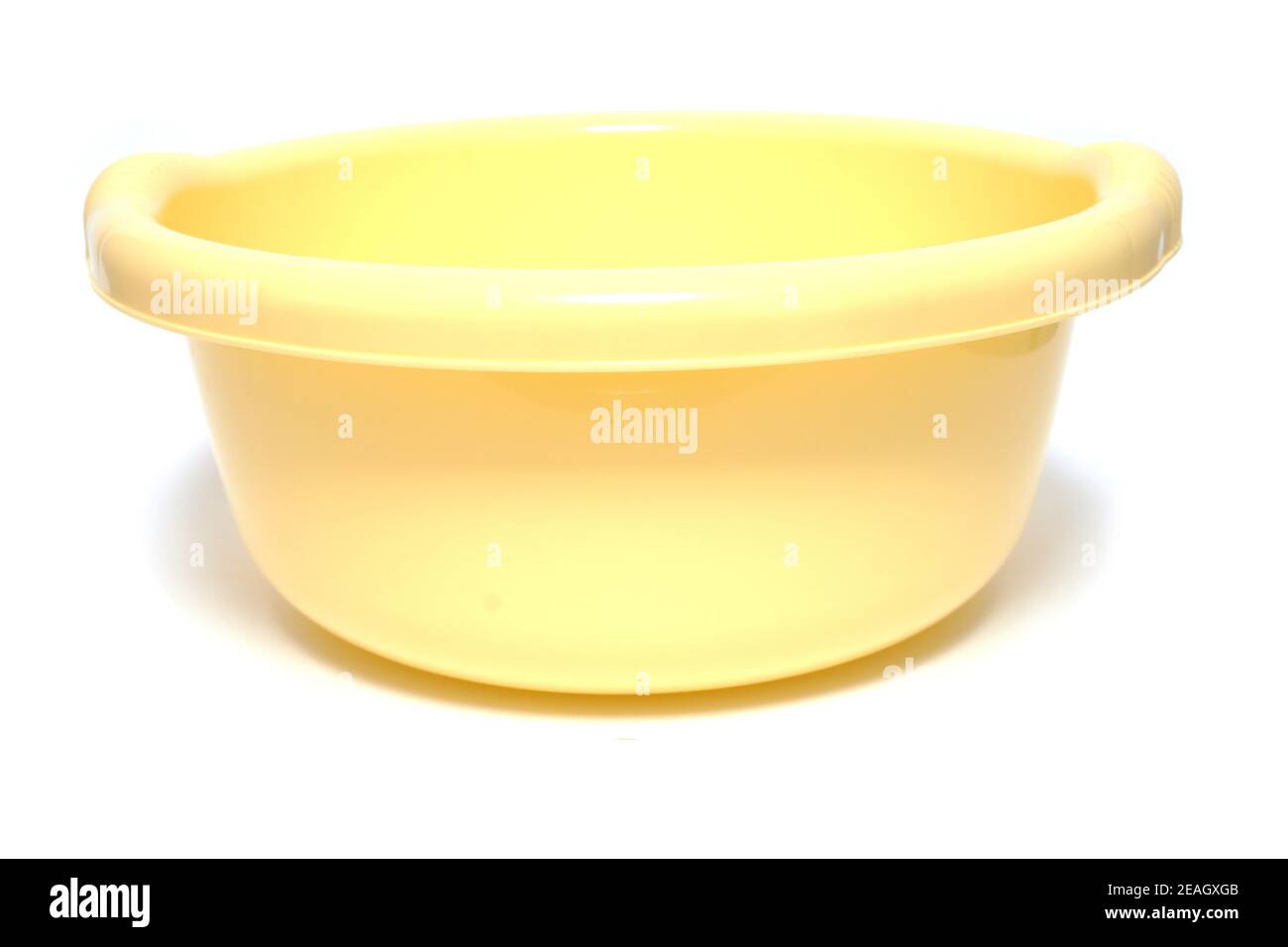 Yellow plastic bowl isolated on white background Stock Photo