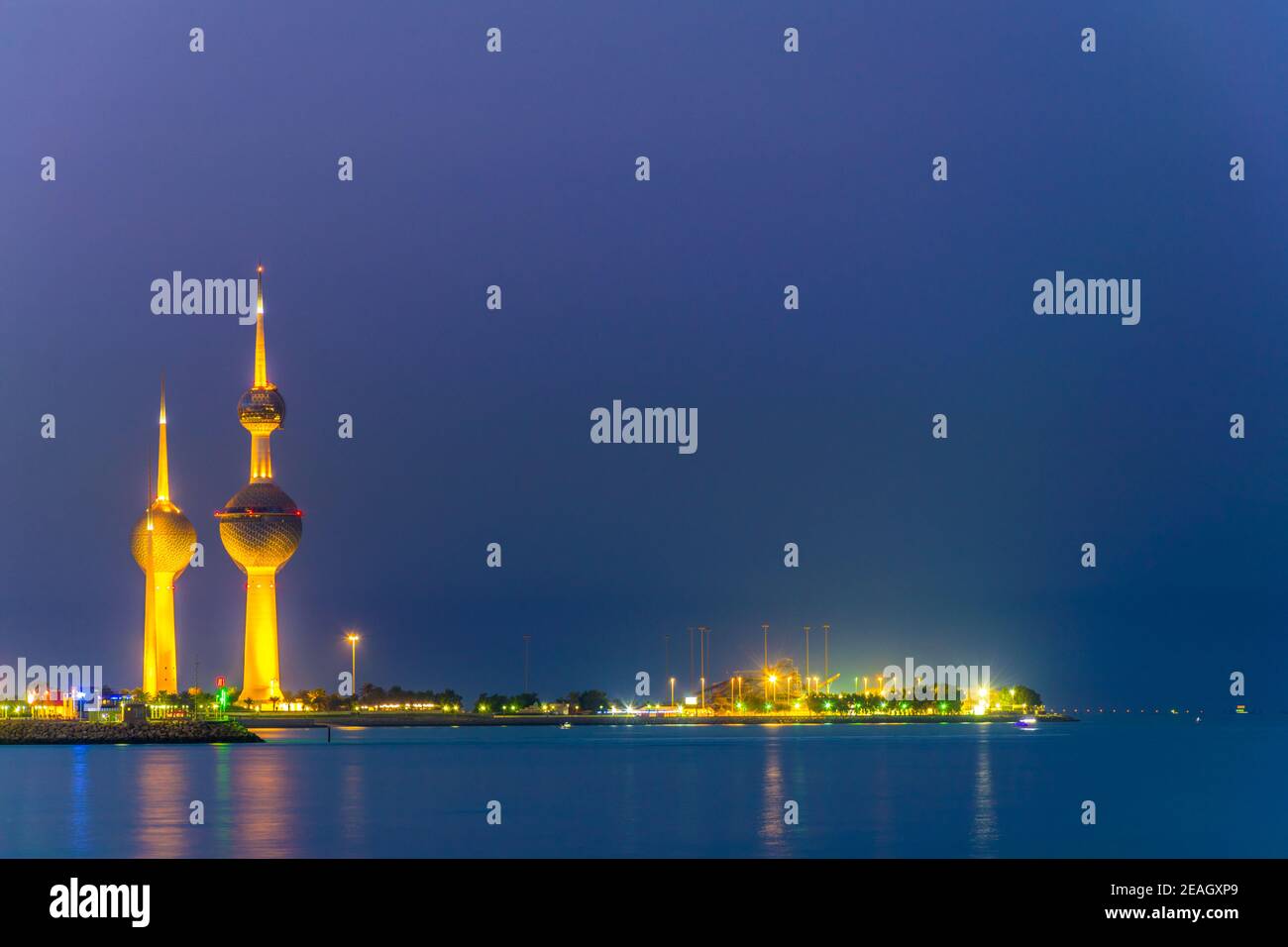 x^View of the illuminated Kuwait Towers - the best known landmark of Kuwait City - during night. Stock Photo