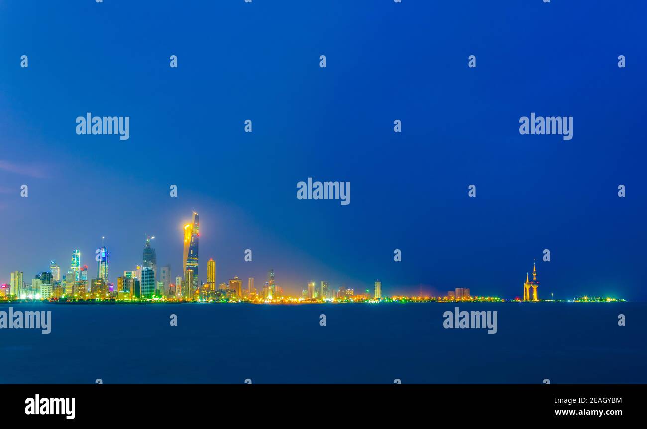 Skyline of Kuwait during night Stock Photo Alamy