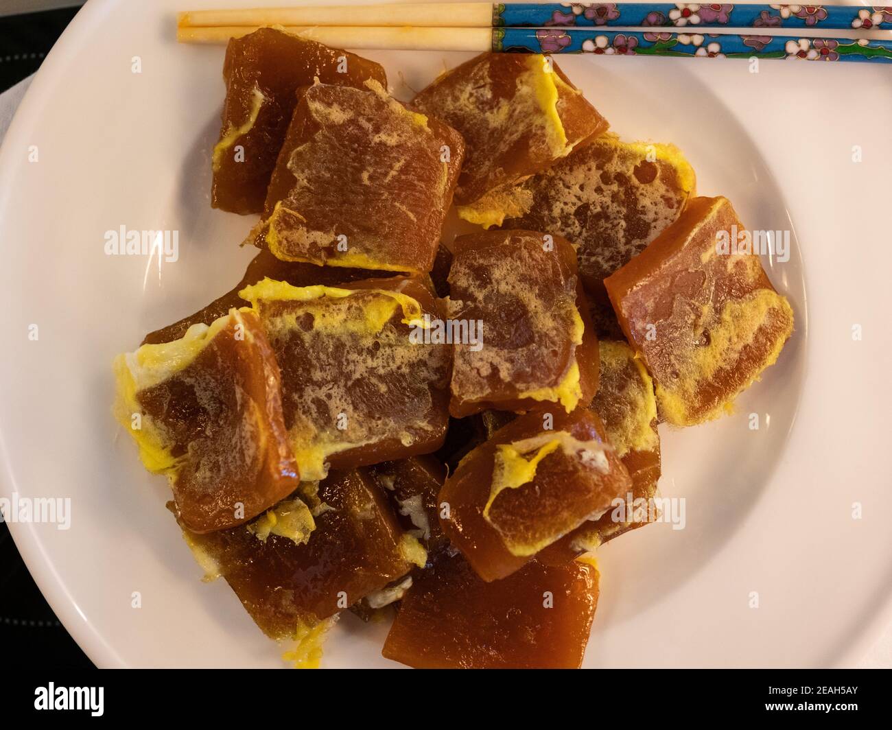 Chinese New Year rice cake cooked with eggs Stock Photo Alamy