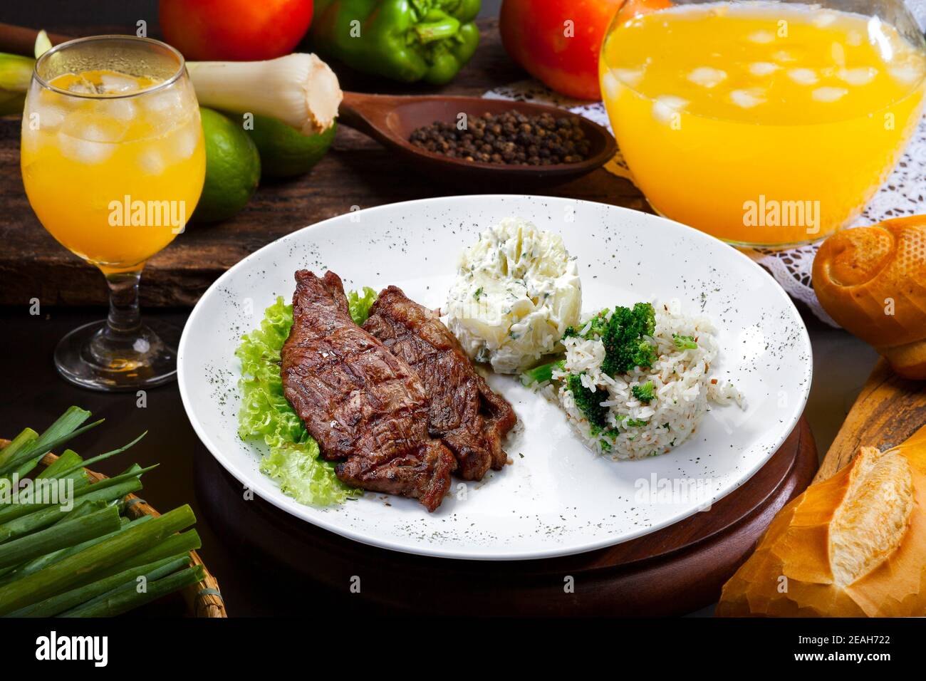 Grilled meat with trimmings Stock Photo Alamy