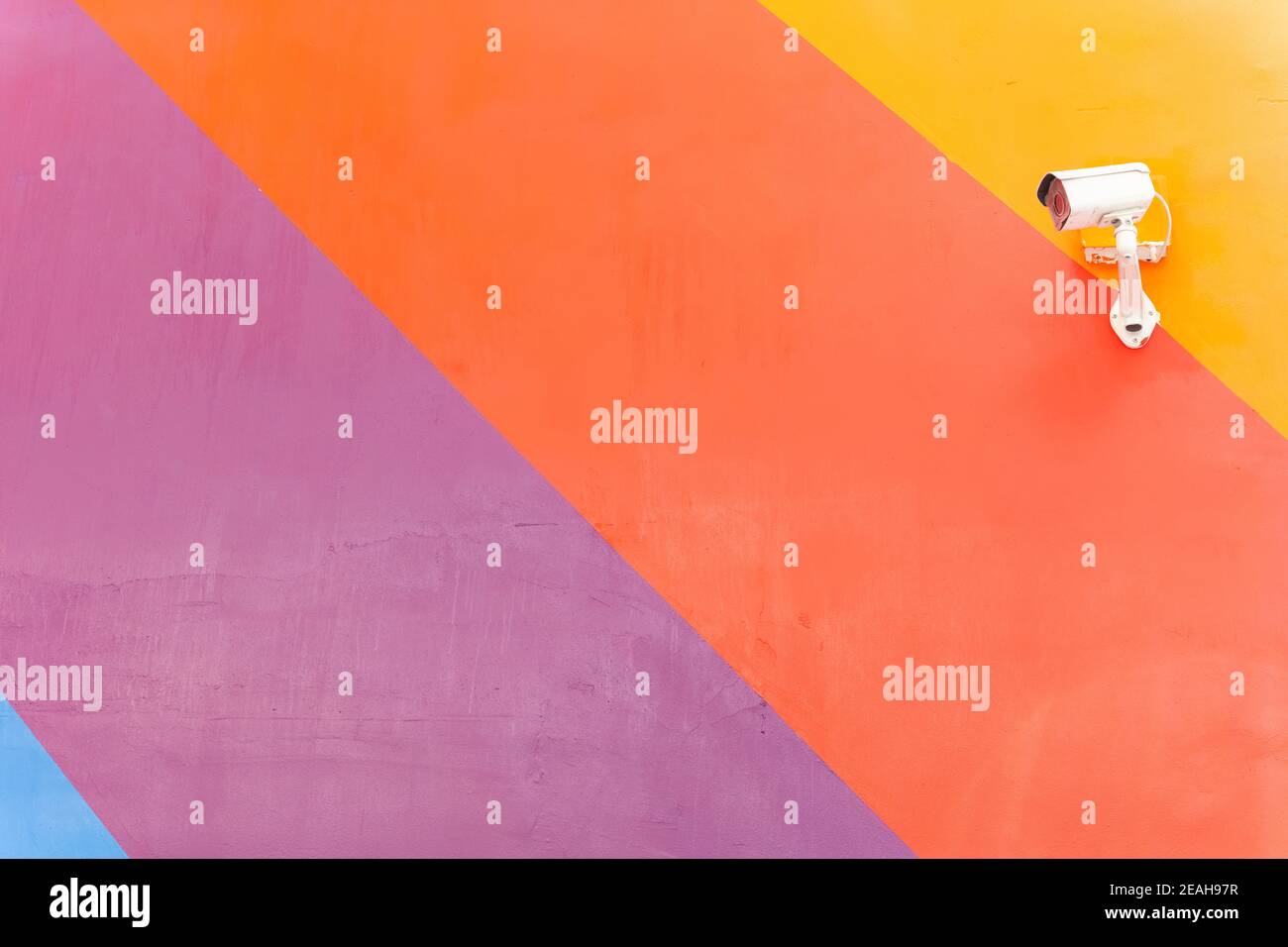 CCTV on a colorful wall Stock Photo