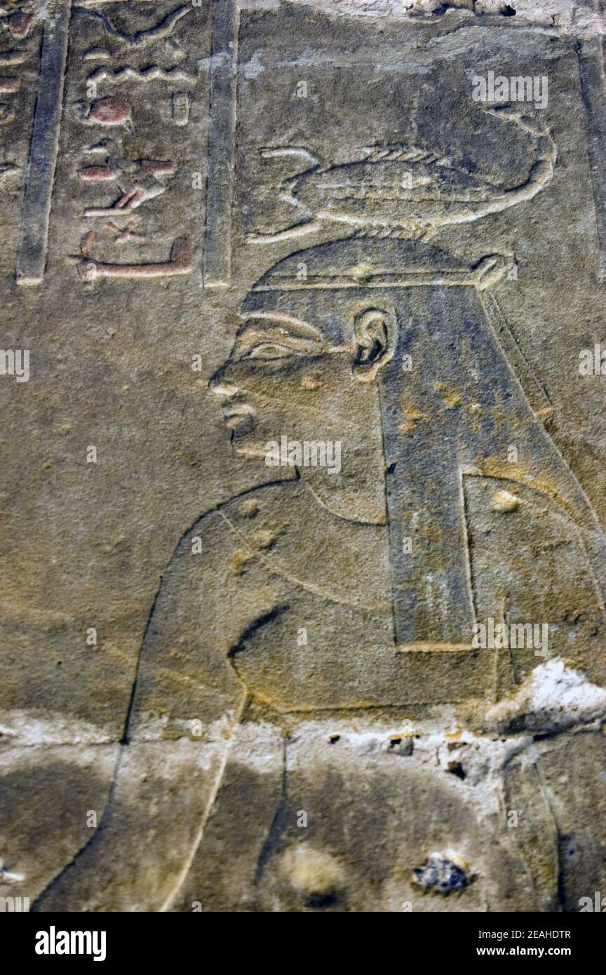 Ancient Egyptian carving of the goddess of magic Serqet shown with a