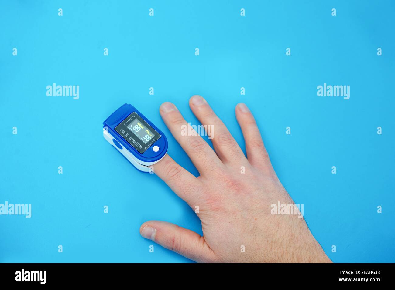 Pulse oximeter used to measure pulse rate and oxygen levels with hand