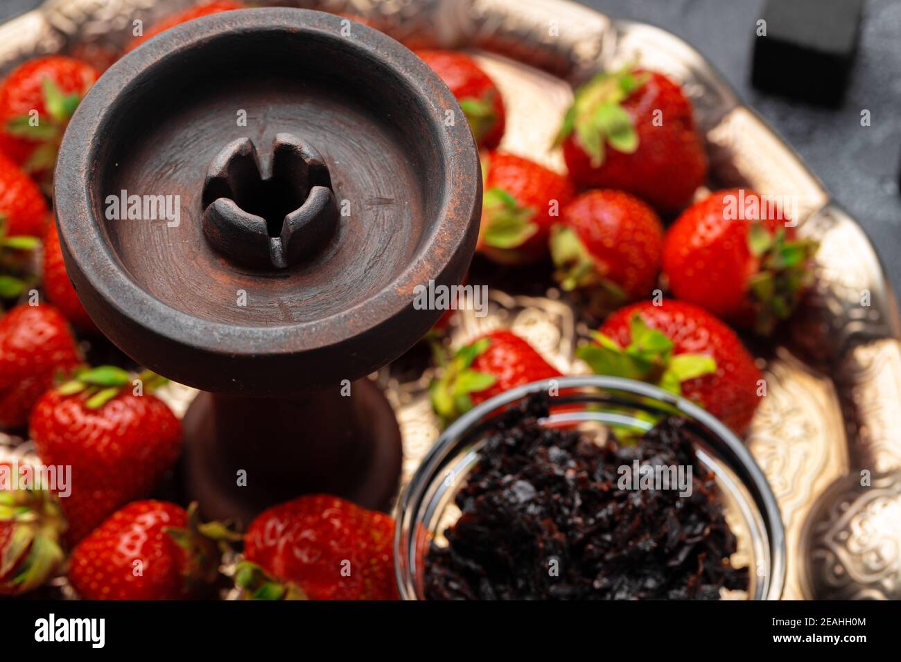 Empty hookah shaft close up on table with fresh fruit Stock Photo
