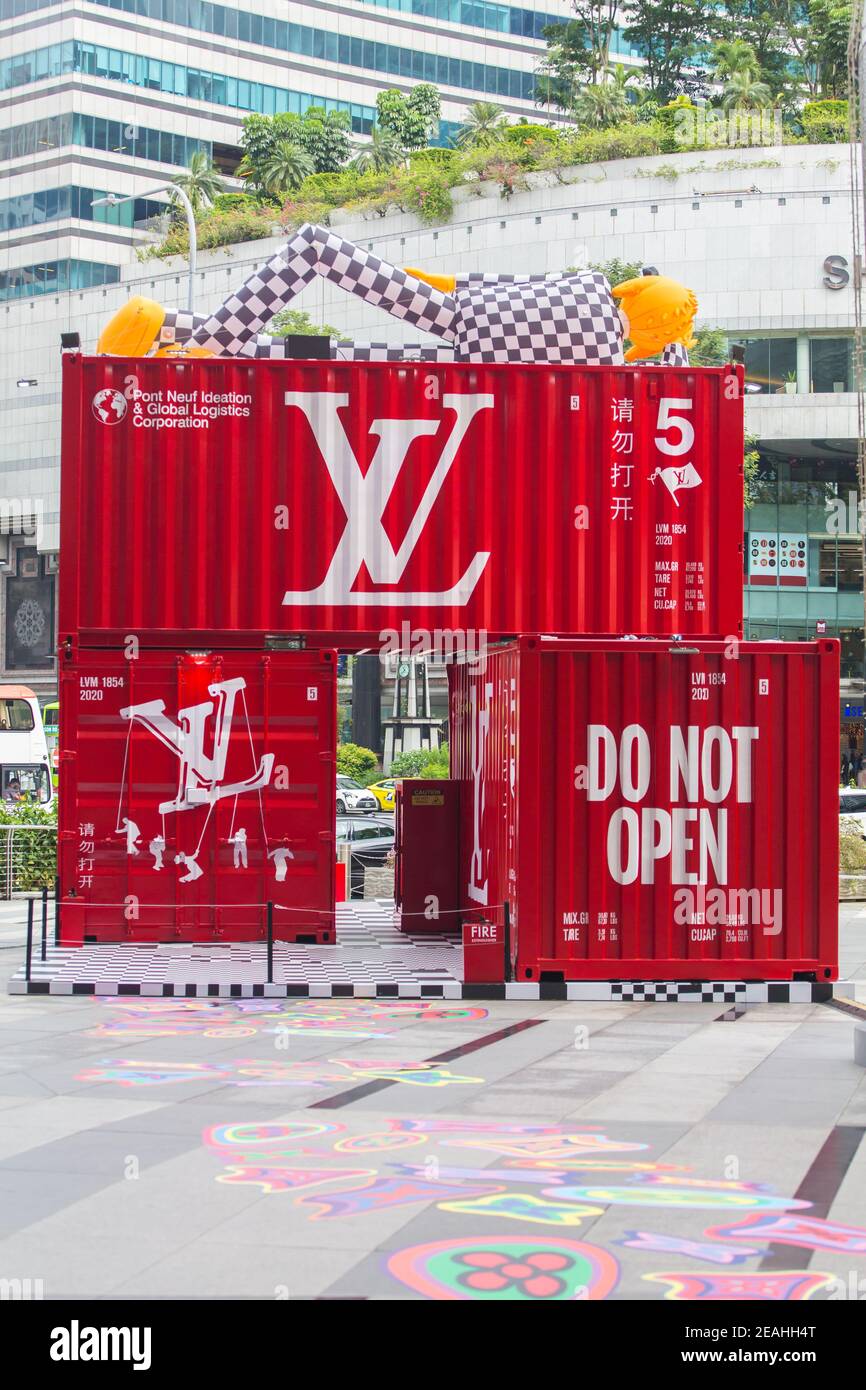 Vertical scene of Louis Vuitton's pop-up installation of red