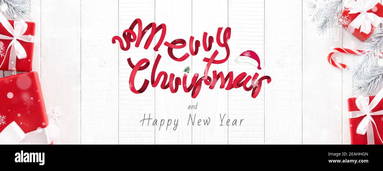 Red ribbon Merry Christmas and Happy New Year greeting text with gift ...