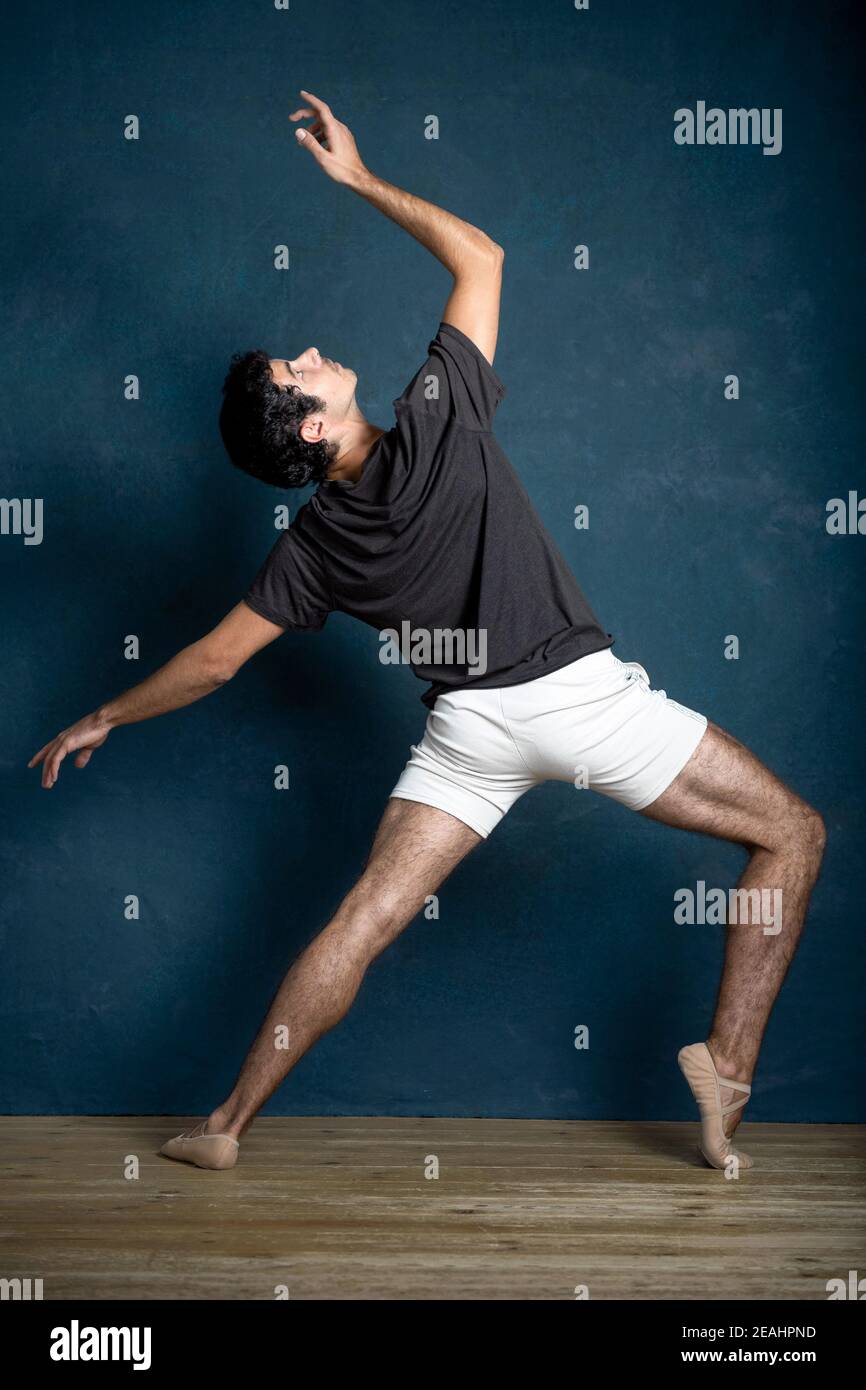 Young Male In Dancer Pose by Michael Rowe