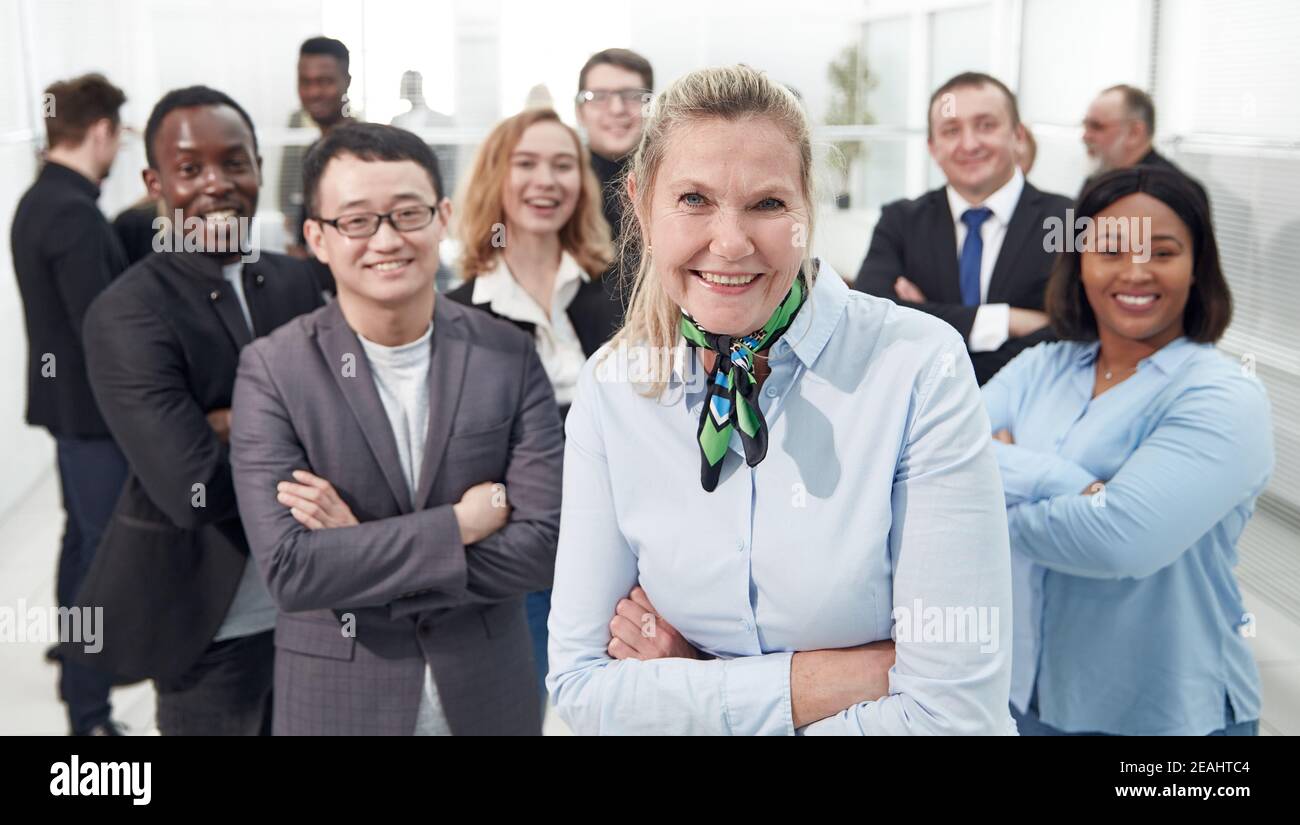 Multi ethnic business people with arms crossed Stock Photo - Alamy