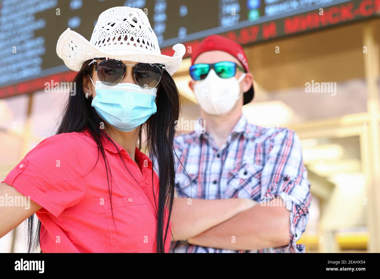 Premium Photo  A man in sunglasses wearing a hoodie with a medical mask on  his face.