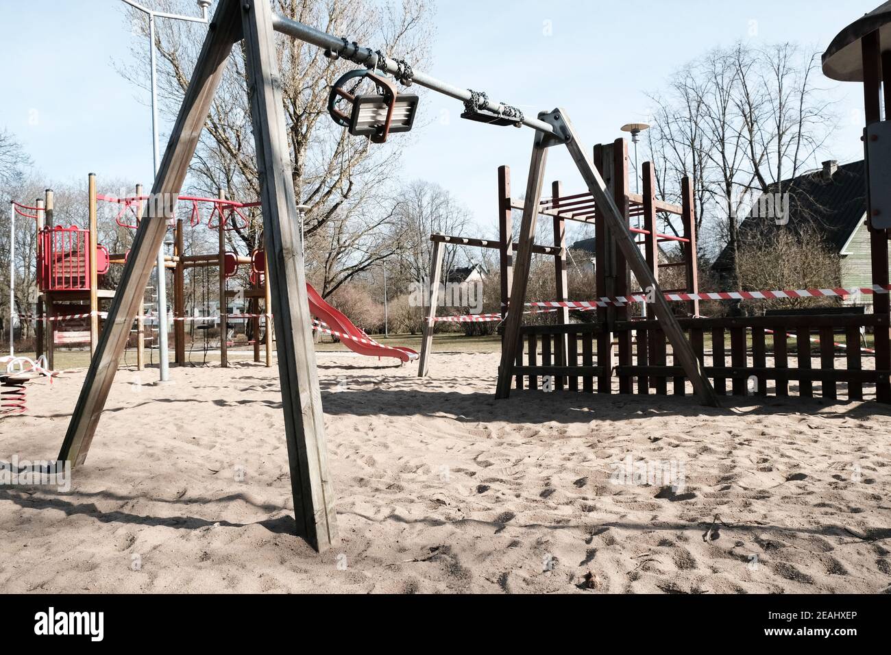 Restricted playground in a city park during COVID-19 lockdown. Stock Photo