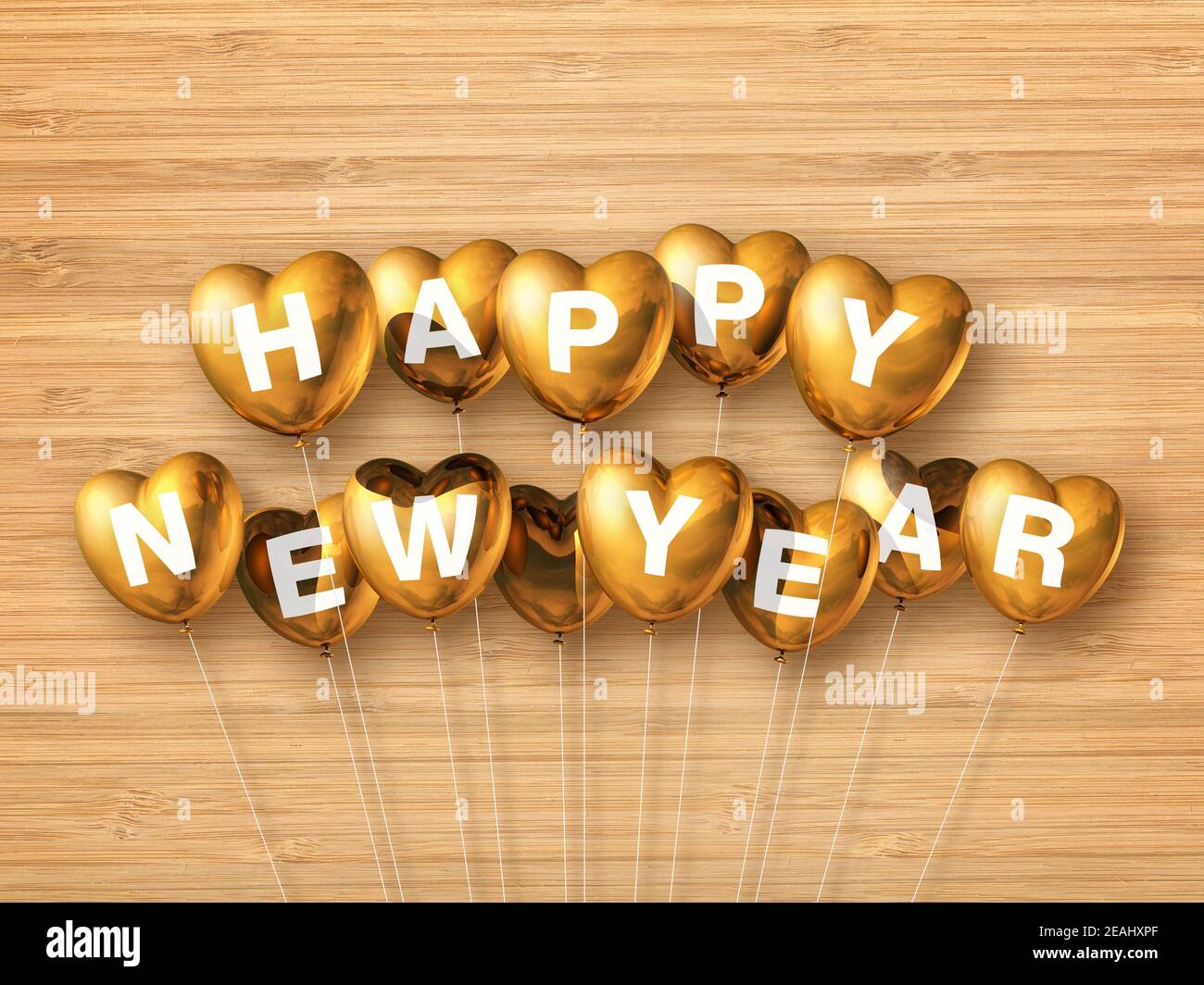 Gold happy new year heart shaped air balloons on a wooden background Stock Photo