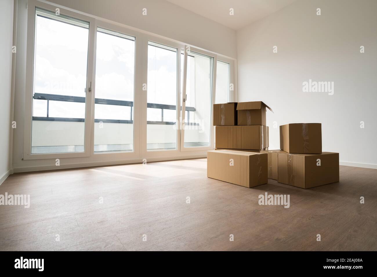 Empty Room With Moving Boxes Stock Photo Alamy
