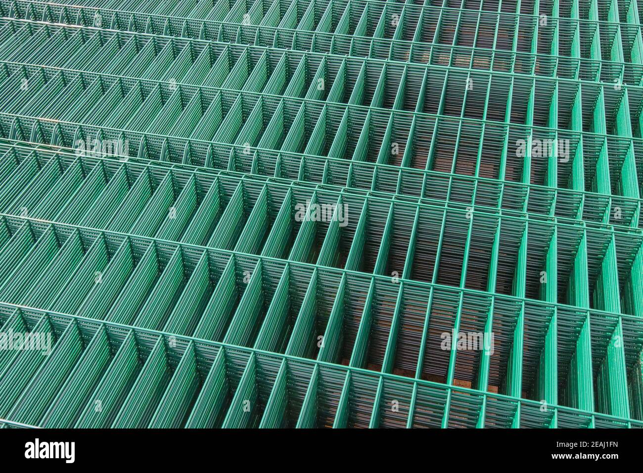 Production of metal mesh for fencing. Stock Photo