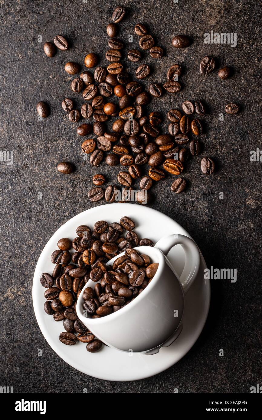 Roasted coffee beans in cup Stock Photo Alamy