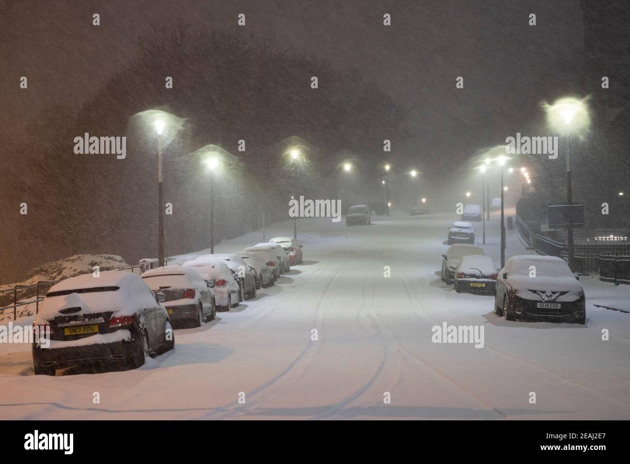 Edinburgh, Scotland, UK. 10 Feb 2021. Big freeze continues in the UK with heavy overnight and morning snow bringing traffic to a standstill on many roads in the city centre. Pic; Blenheim Place at 6qm was covered in thick snow.  Iain Masterton/Alamy Live news Stock Photo