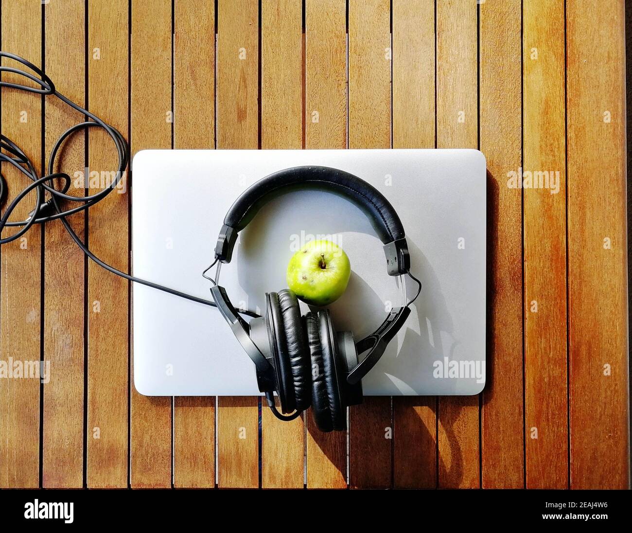 Mac Book Air Apple Headphones wood Stock Photo