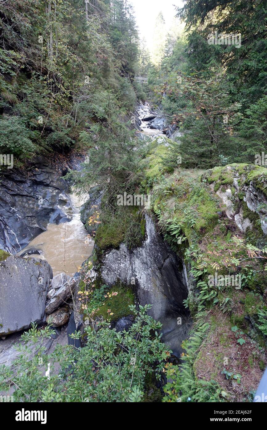 Hiking on the gorge trail Passeier Valley between Moos and St. Leonhard Stock Photo