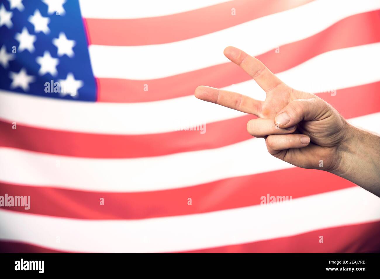 American flag with victory sign Stock Photo