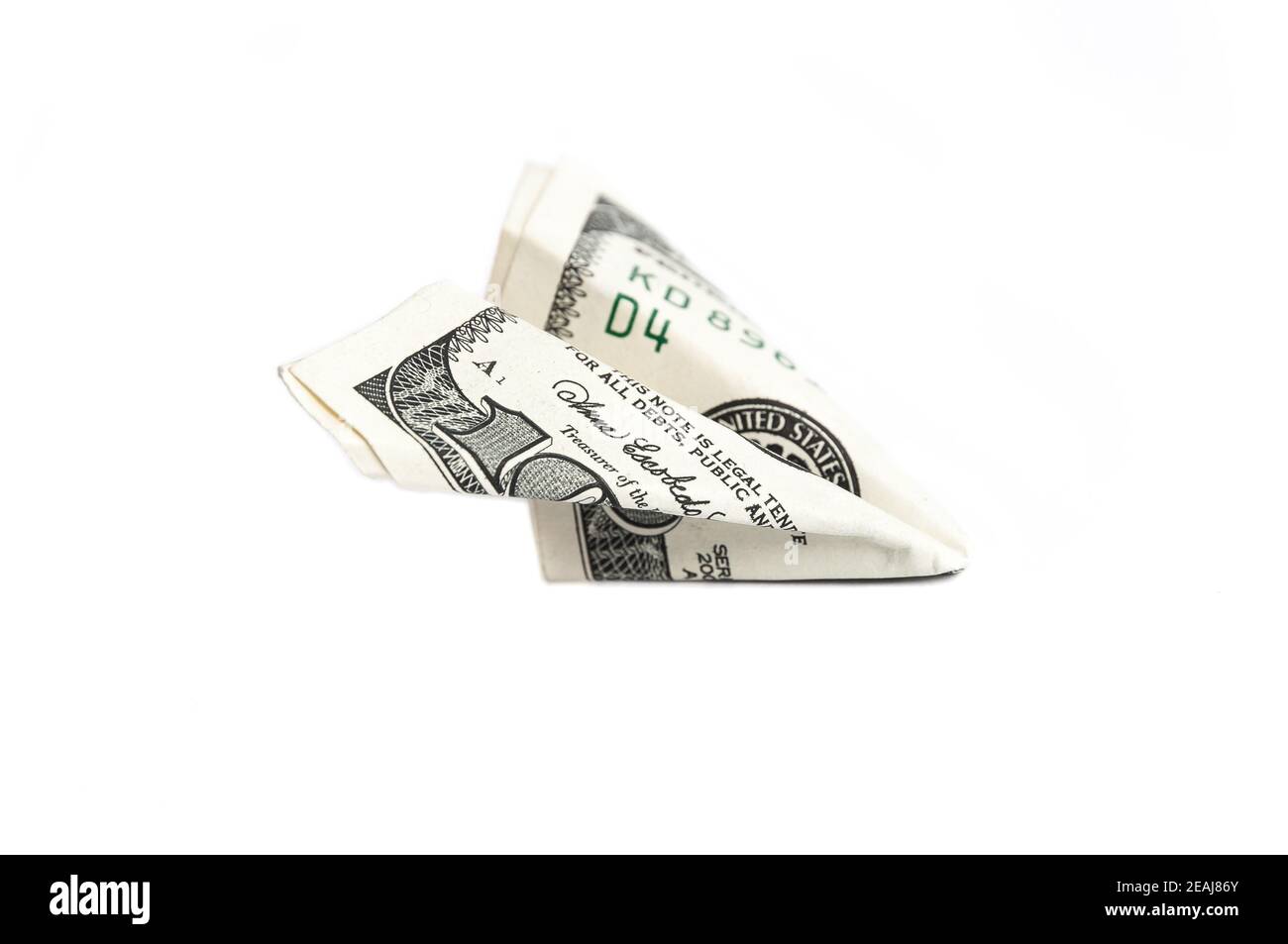 A paper airplane made from a bill of one hundred dollars. Stock Photo