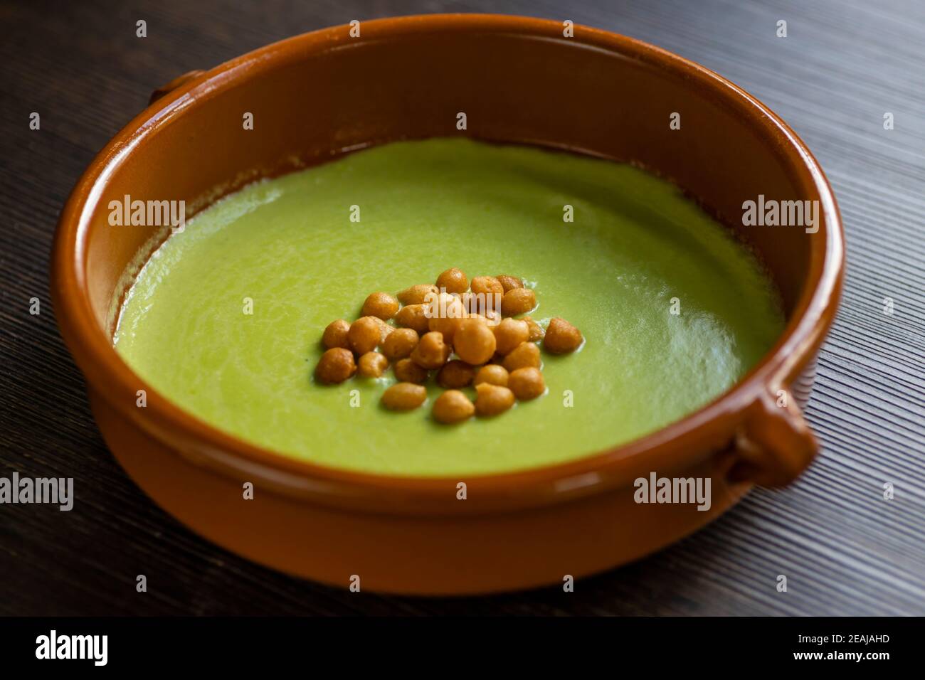 still life of green peas soup Stock Photo