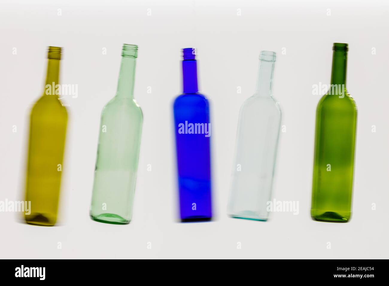 five colorful empty wine bottles Stock Photo