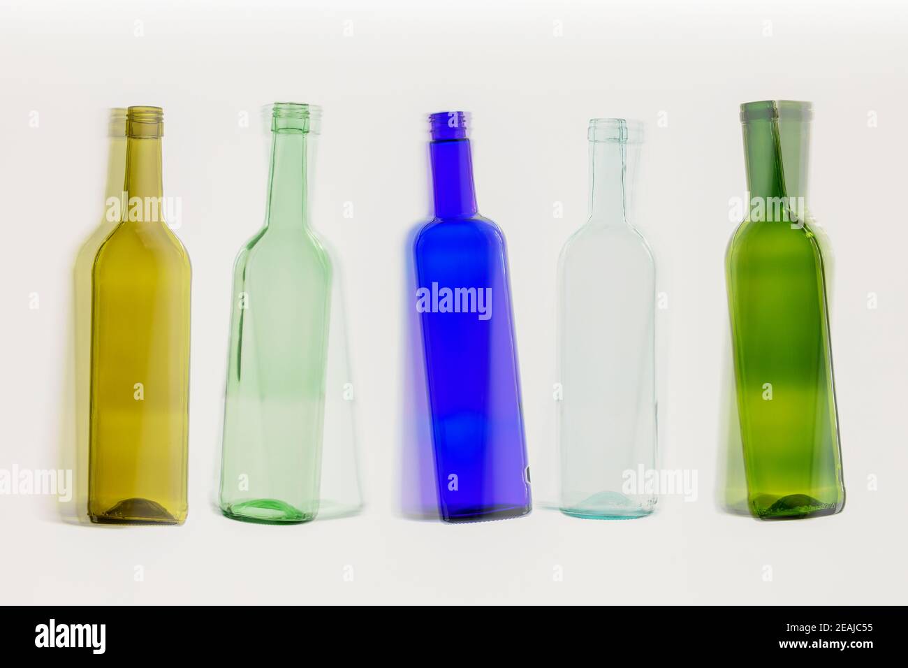 five colorful empty wine bottles Stock Photo