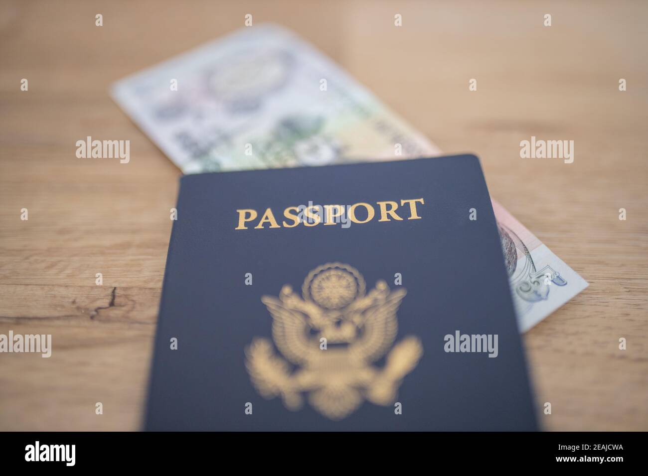 United States of America Passport with a Five Honduran Lempiras Bill Inside Stock Photo