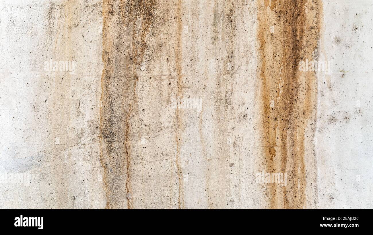 Old and grunge cement, concrete or plaster wall with patterns and cracks Stock Photo