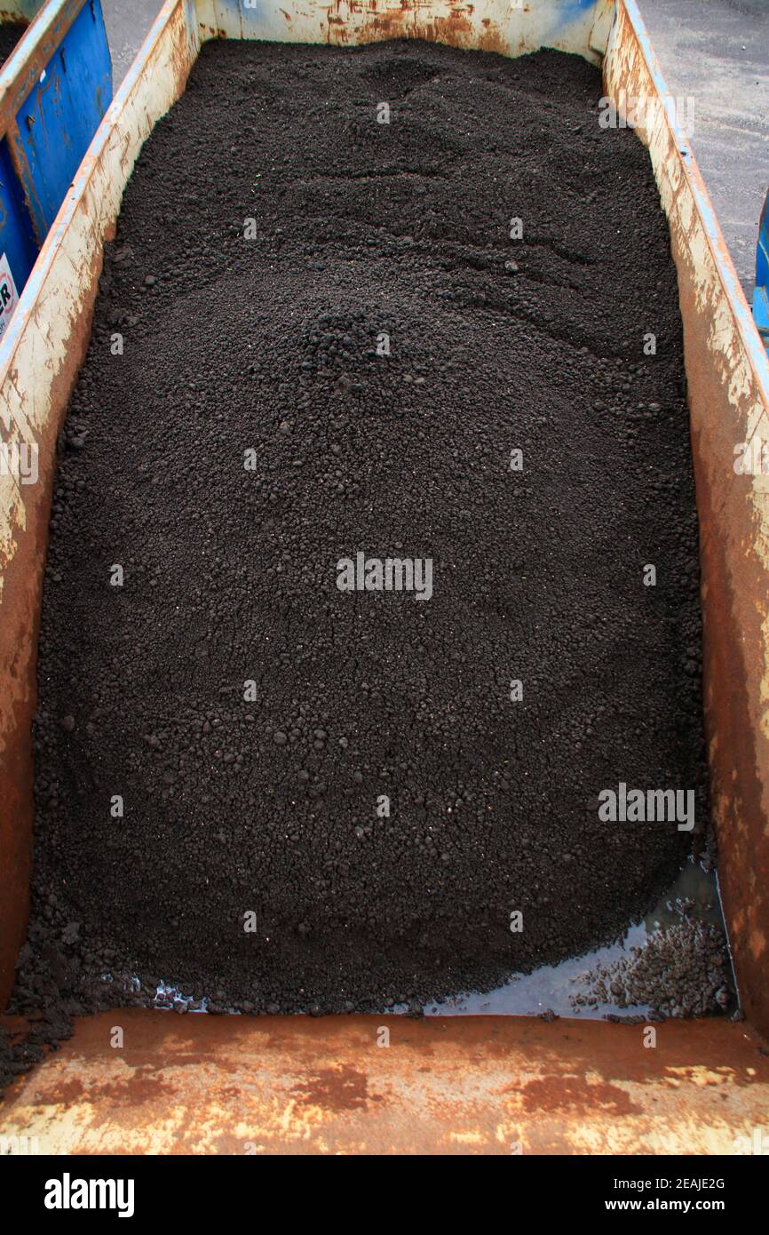 Sewage sludge from a sewage treatment plant in a container Stock Photo