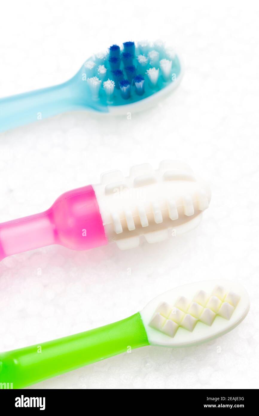 Still life teethers and toothbrush Stock Photo