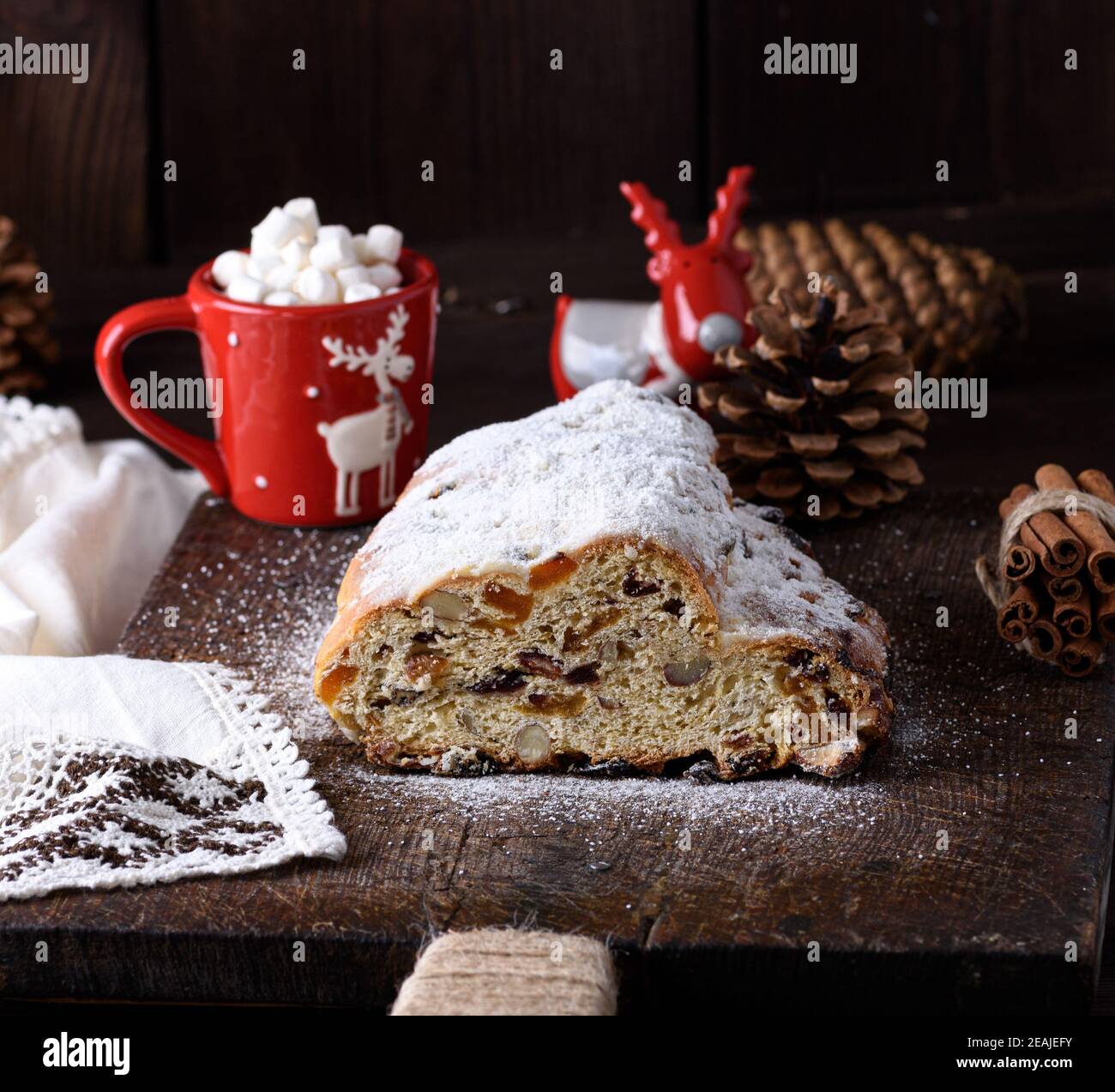 Stollen, a traditional European cake with nuts and candied fruit Stock Photo Alamy
