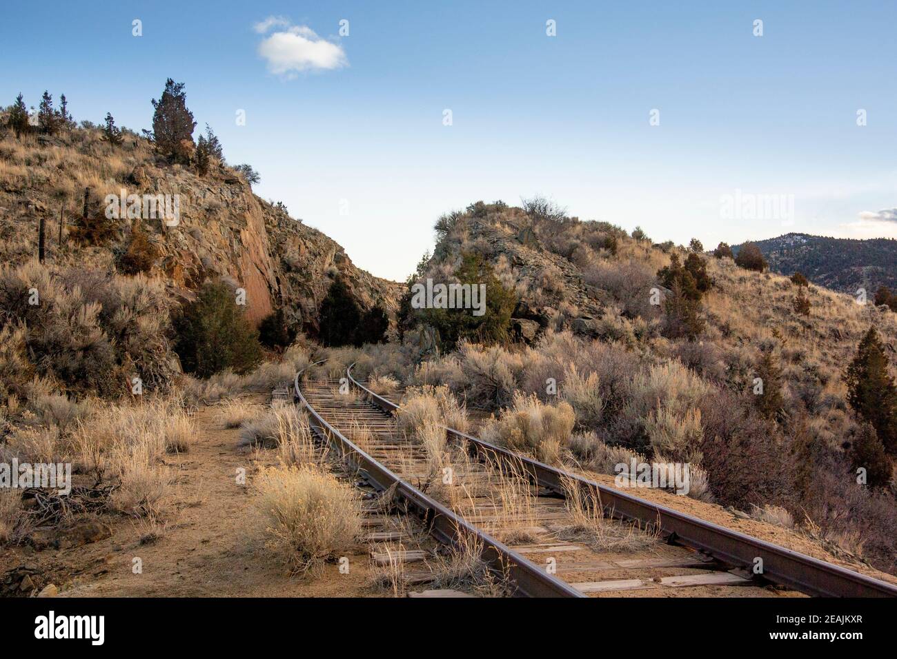 The old, abandoned Milwaukee Road railroad tracks, up on Spire Rock Flats, on a cold winter afternoon, near Pipestone, in Jefferson County, Montana. T Stock Photo
