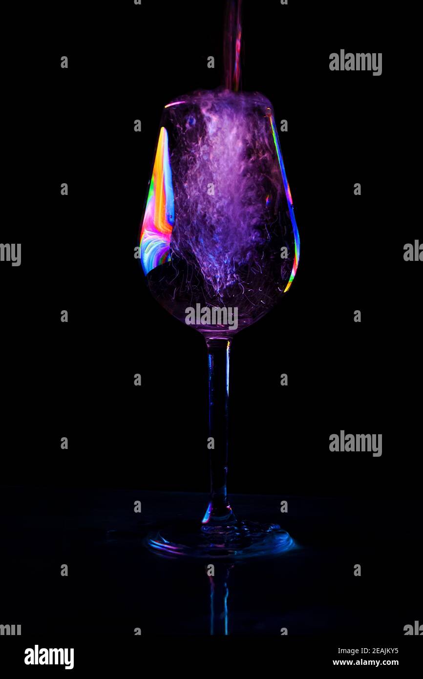 wine poured into a glass cup Stock Photo Alamy